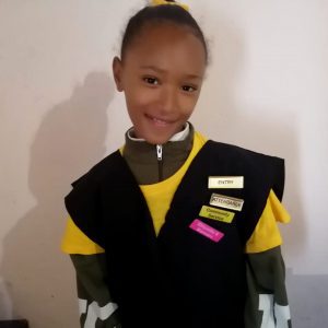 PowerGirl Mamello (11) toont haar insignes
